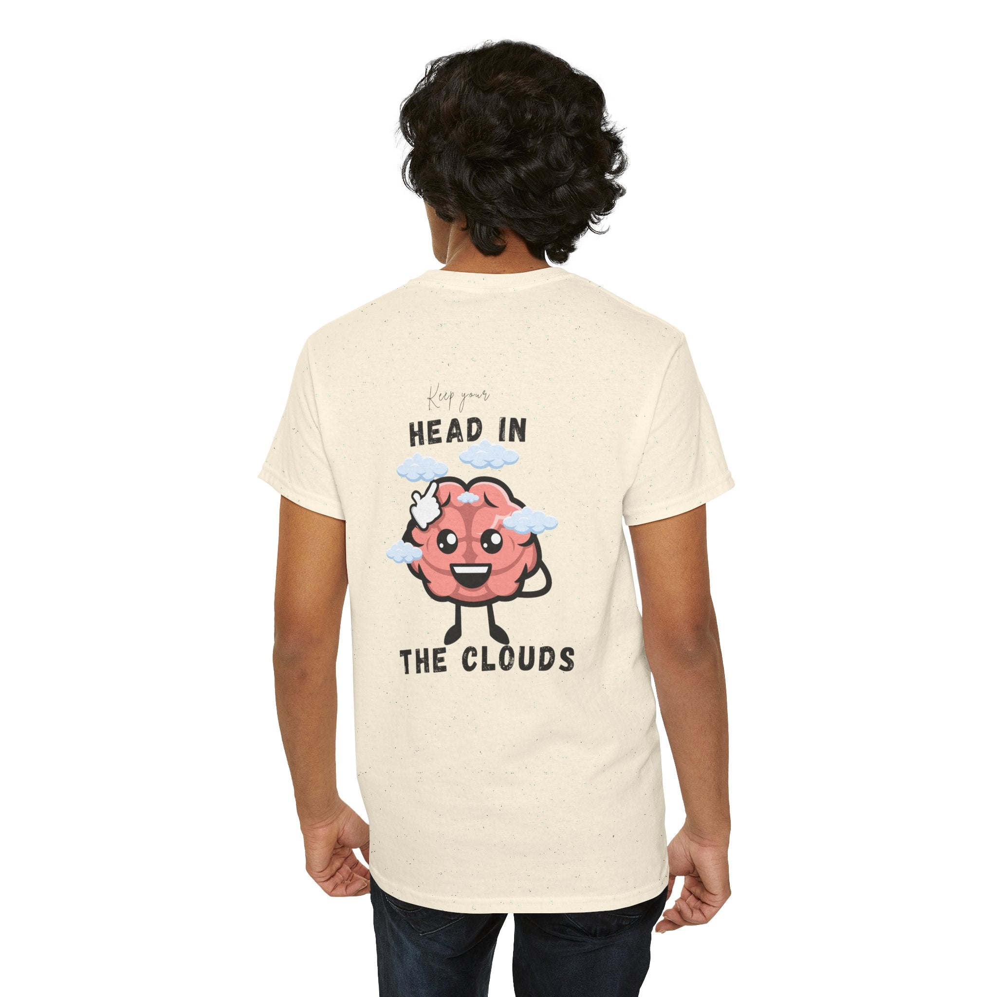 Person wearing a cream t-shirt with a cloud-themed design and text on the back.