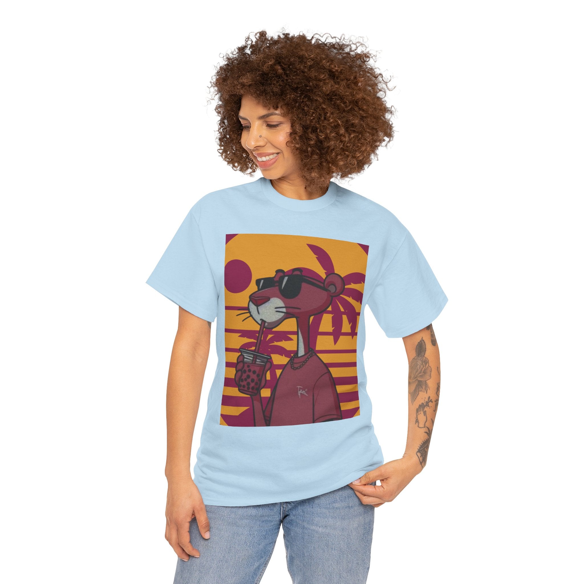 Person wearing a light blue t-shirt with a colorful graphic design on a white background