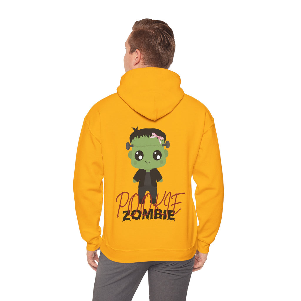 Person wearing a Gold hoodie with a cartoon zombie design on the back