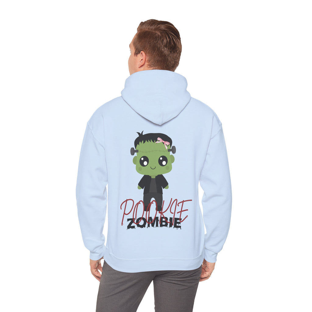 Light blue hoodie with a cartoon zombie design on the back, worn by a person.