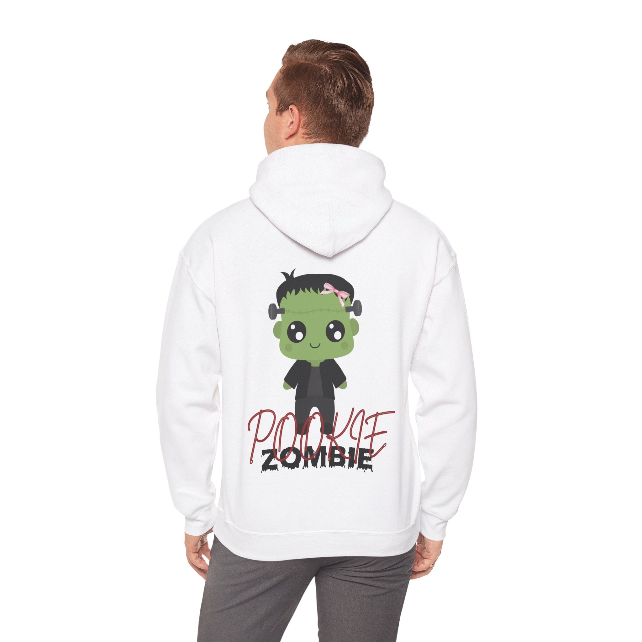 Person wearing a white hoodie with a cartoon zombie design on the back