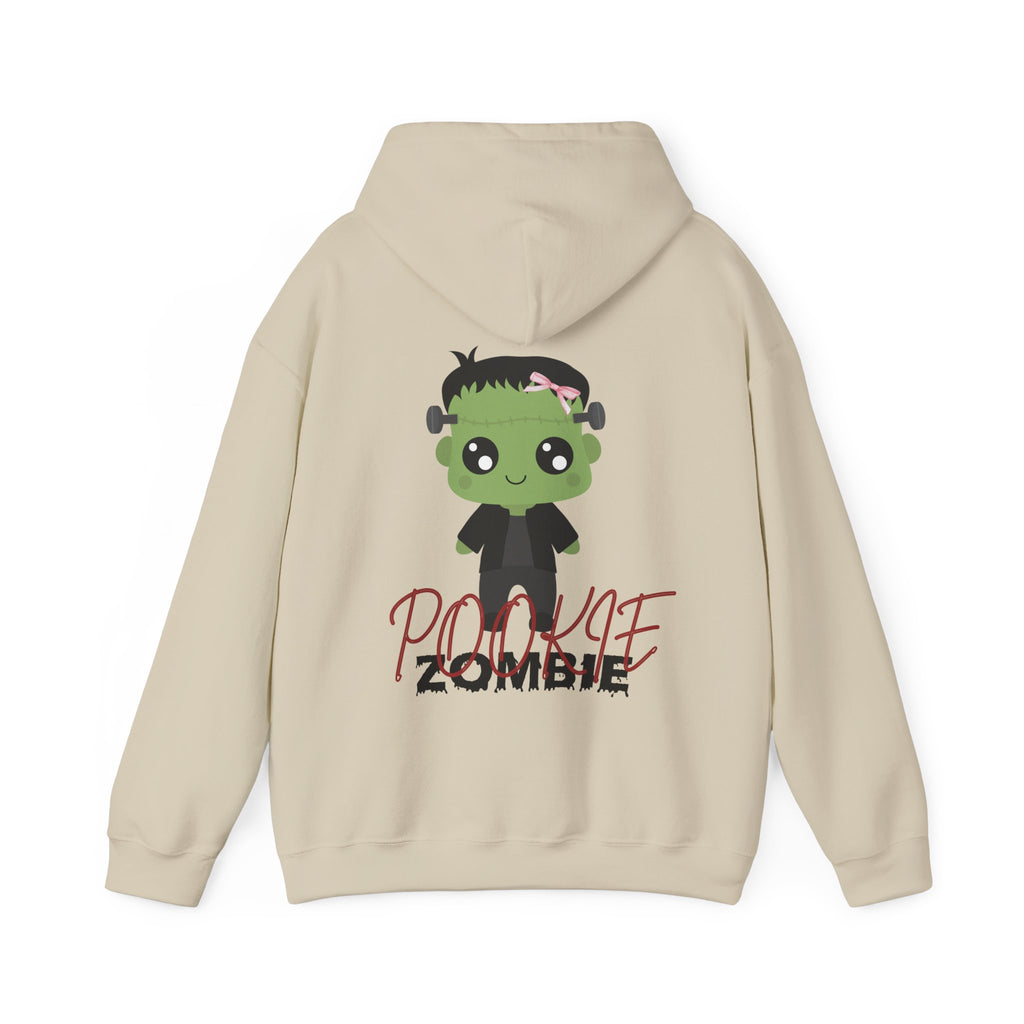 Sand hoodie with a cartoon zombie design on the back against a white background
