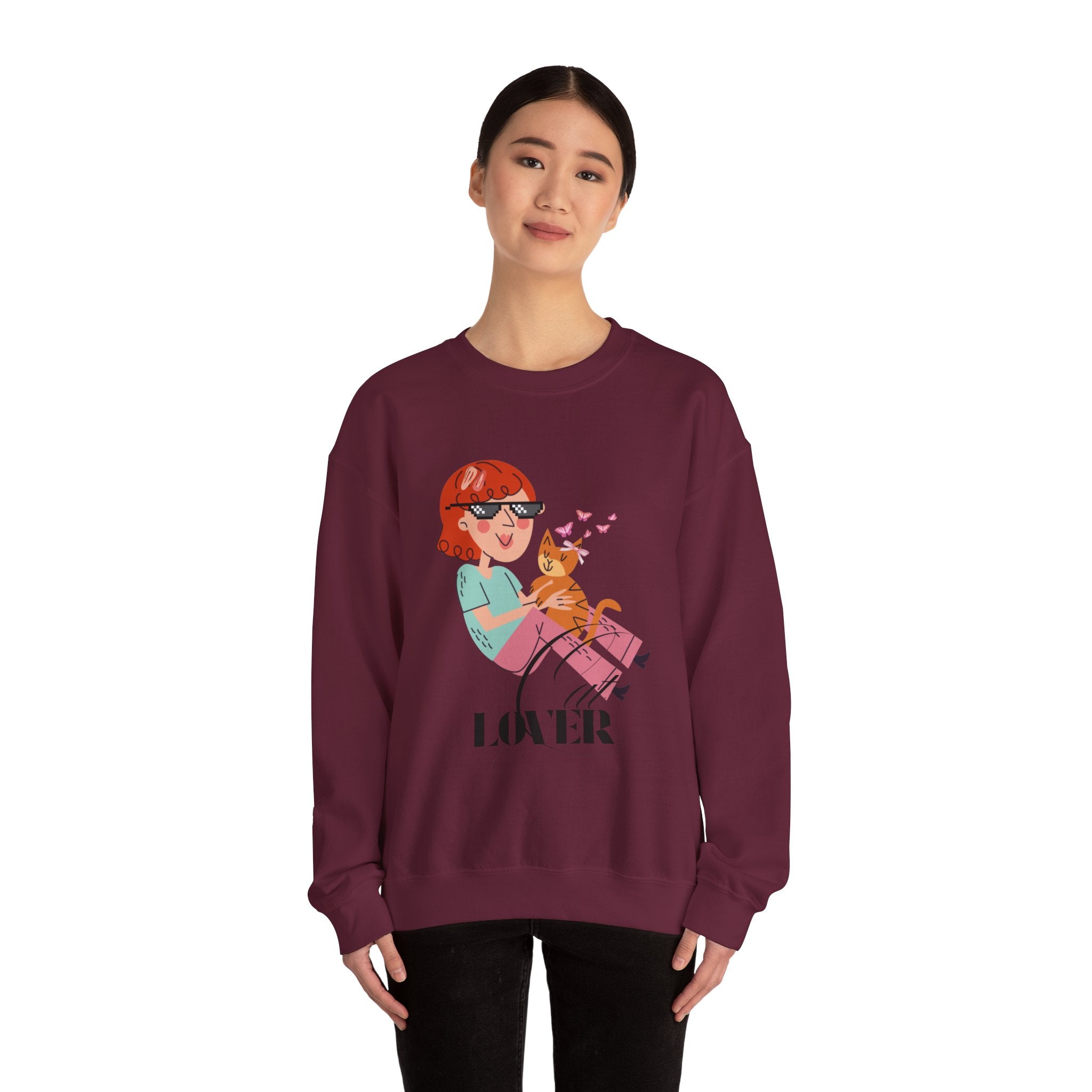 Maroon sweatshirt with a graphic design of a woman and a cat on a white background