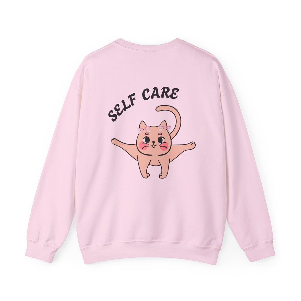 Light Pink sweatshirt with a cartoon cat and 'SELF CARE' text on a white background