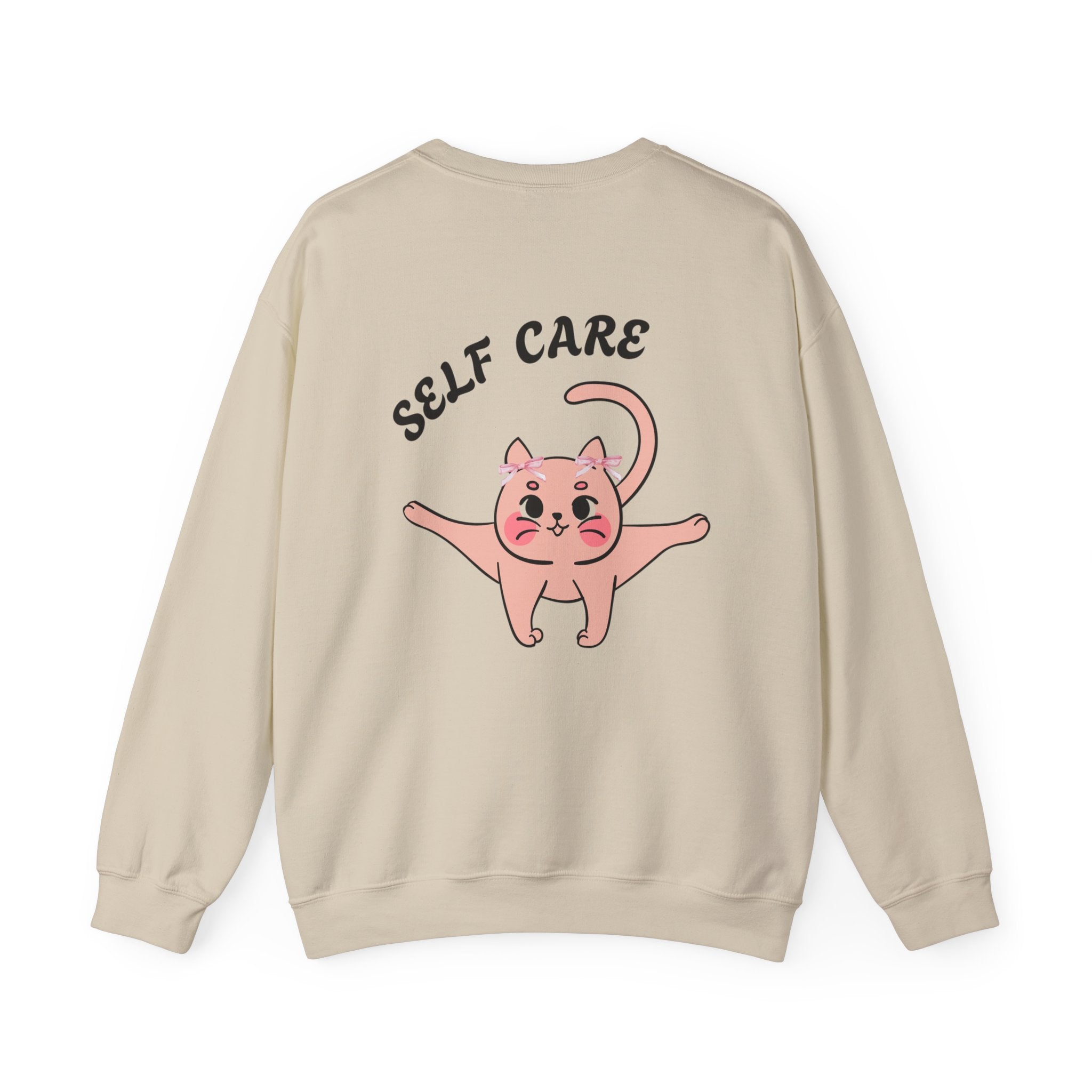 Sand sweatshirt with a pink cat illustration and 'SELF CARE' text on a white background