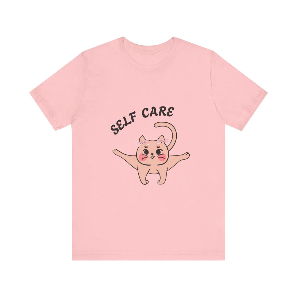 Pink t-shirt with a cat illustration and 'SELF CARE' text on a white background