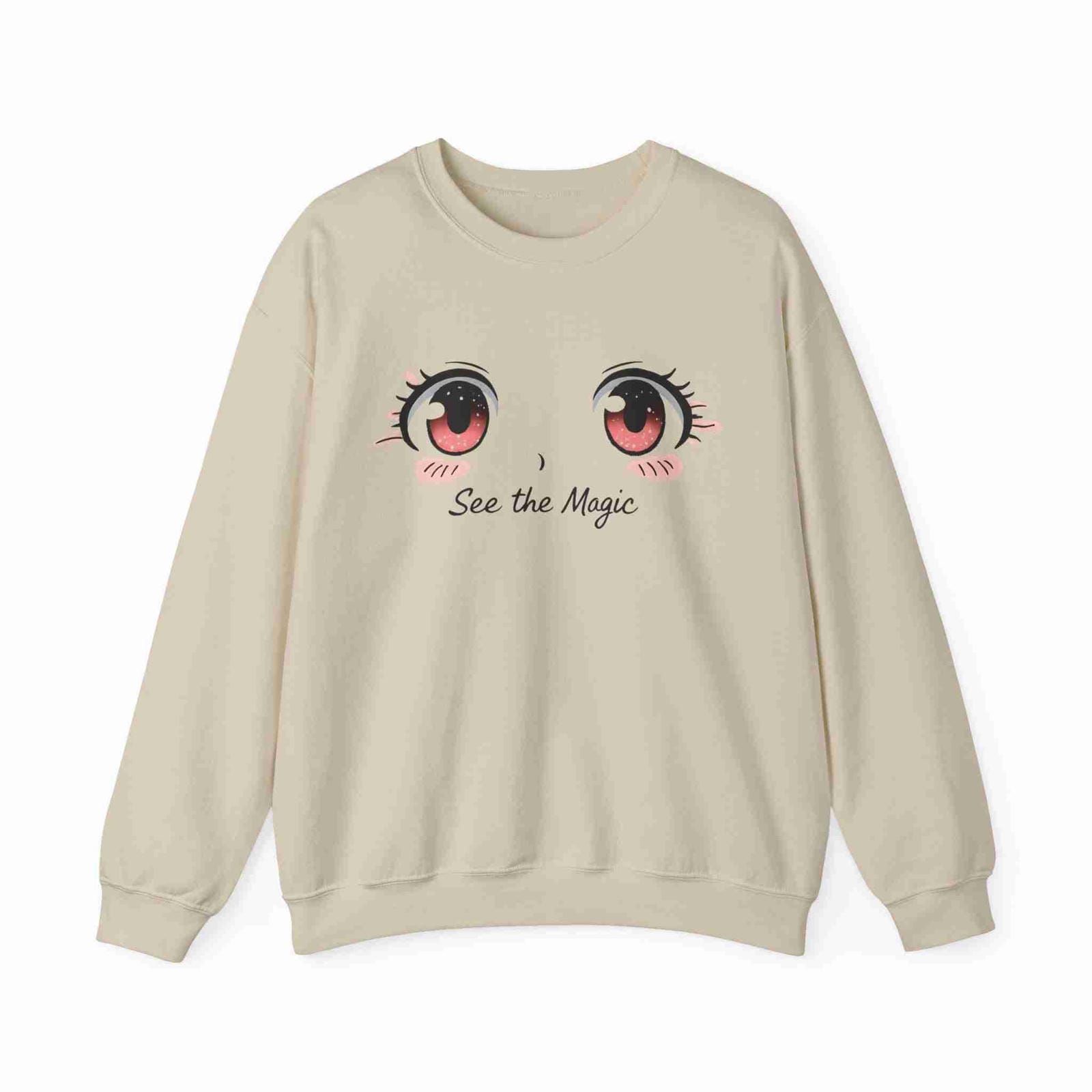 Sand sweatshirt with cartoon eyes and 'See the Magic' text on a white background