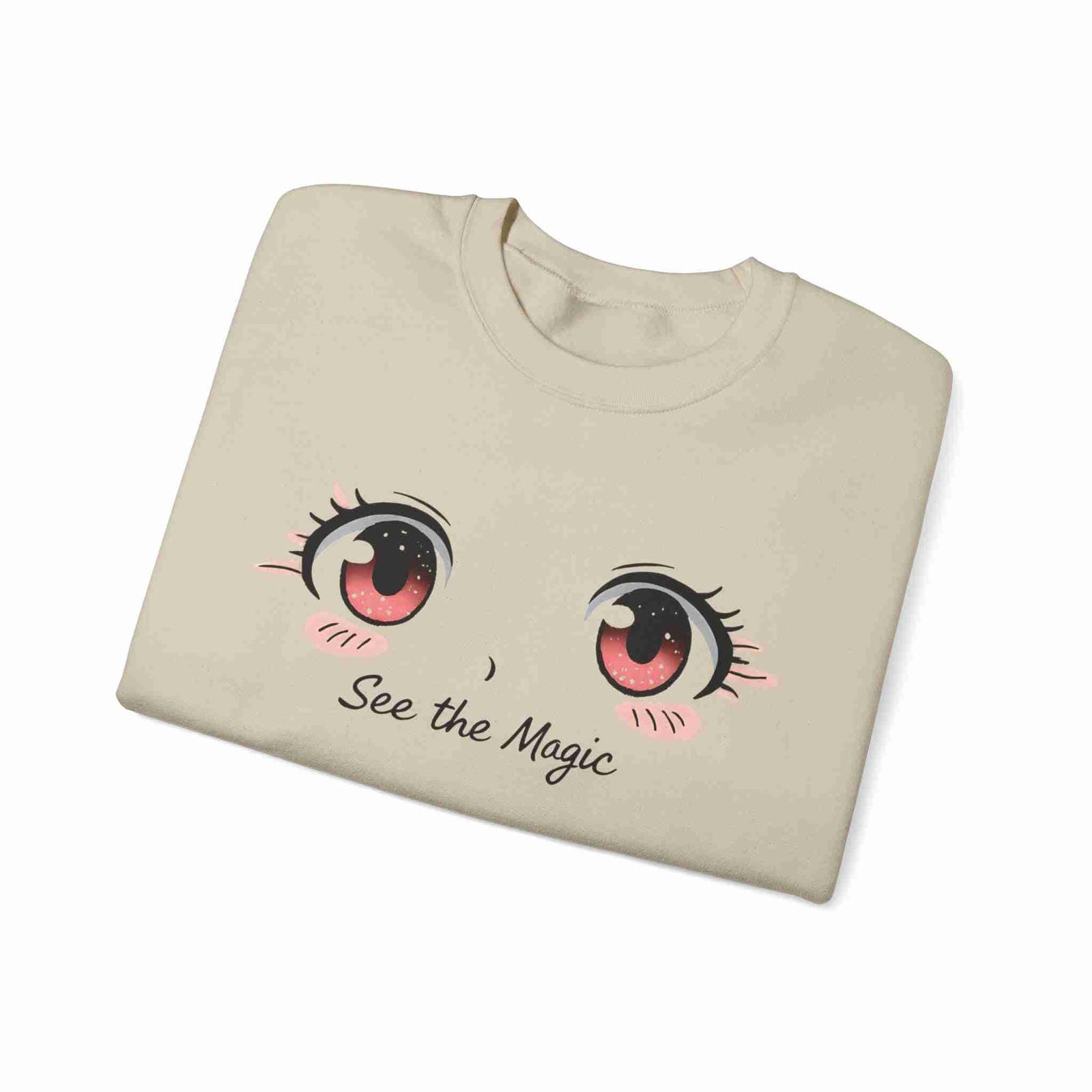 Sand sweatshirt with cartoon eyes and 'See the Magic' text on a white background