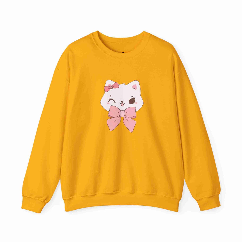 Gold sweatshirt with a cartoon cat design featuring a pink bow on a white background