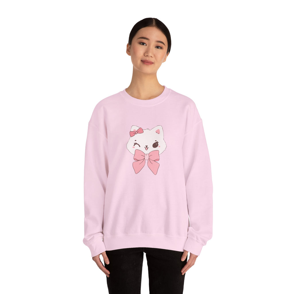 Person wearing a Light pink sweatshirt with a cartoon cat design on a white background