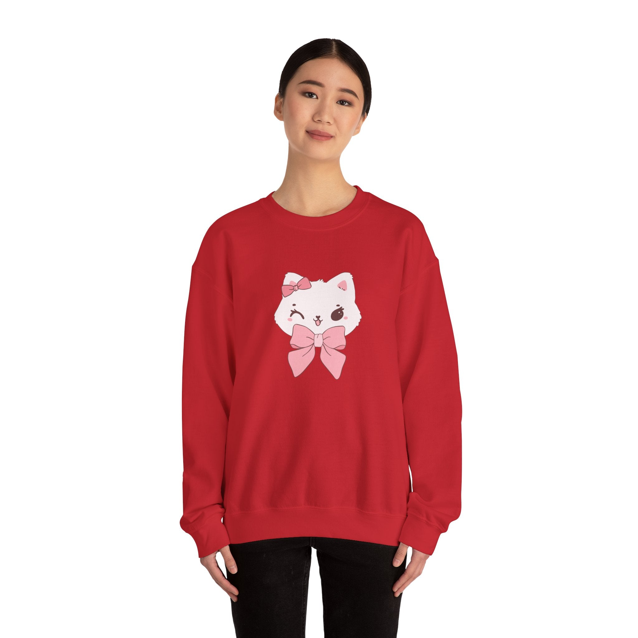 Person wearing a red sweatshirt with a cartoon cat design on a white background