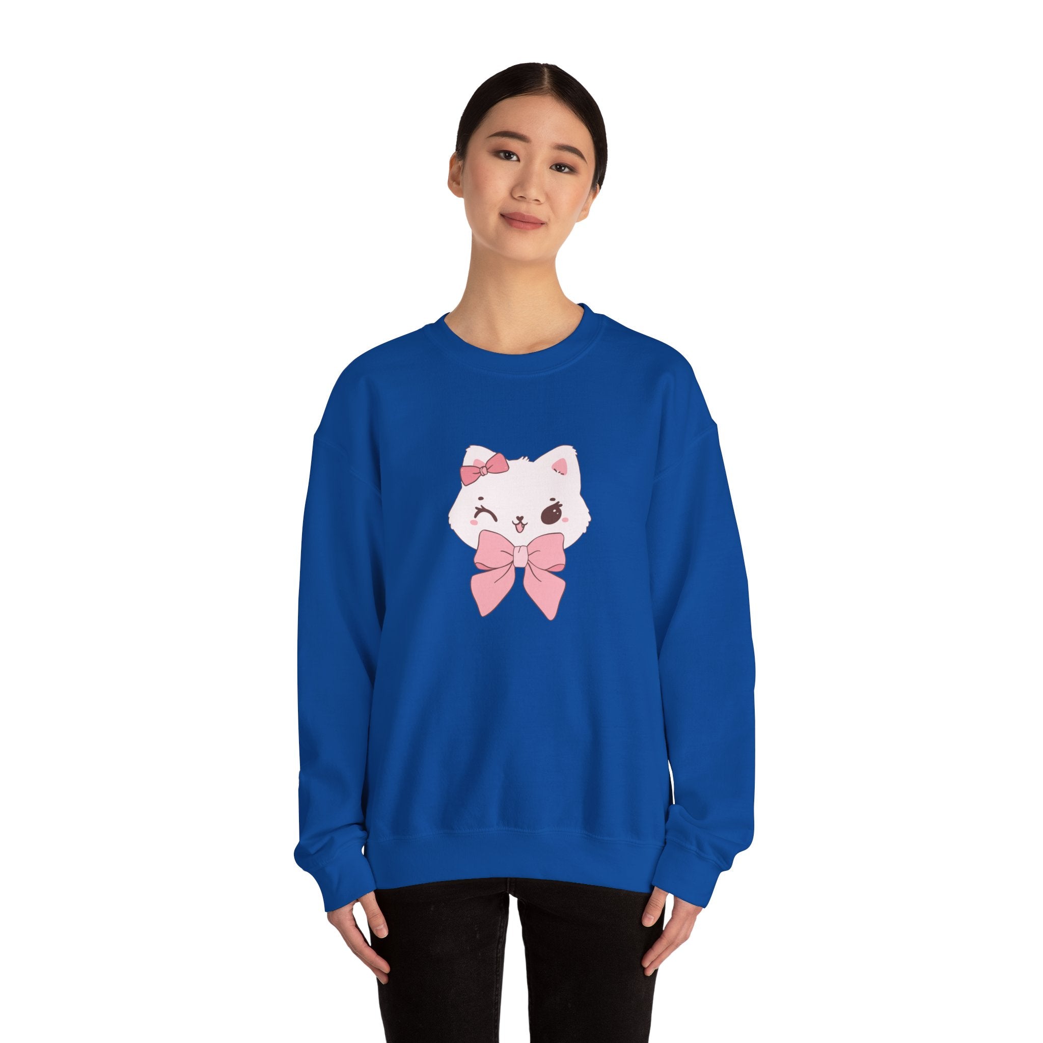 Person wearing a Royal sweatshirt with a cartoon cat design on a white background