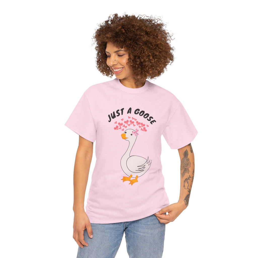 Person wearing a Light pink t-shirt with a goose graphic and text on a white background