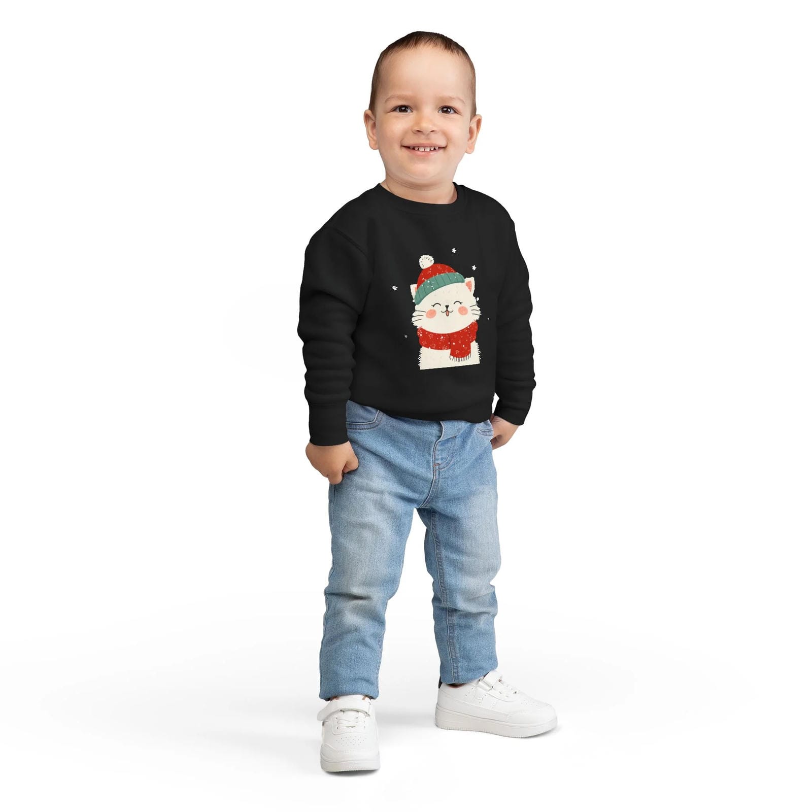 Child wearing a black sweater with a Christmas-themed design on a white background