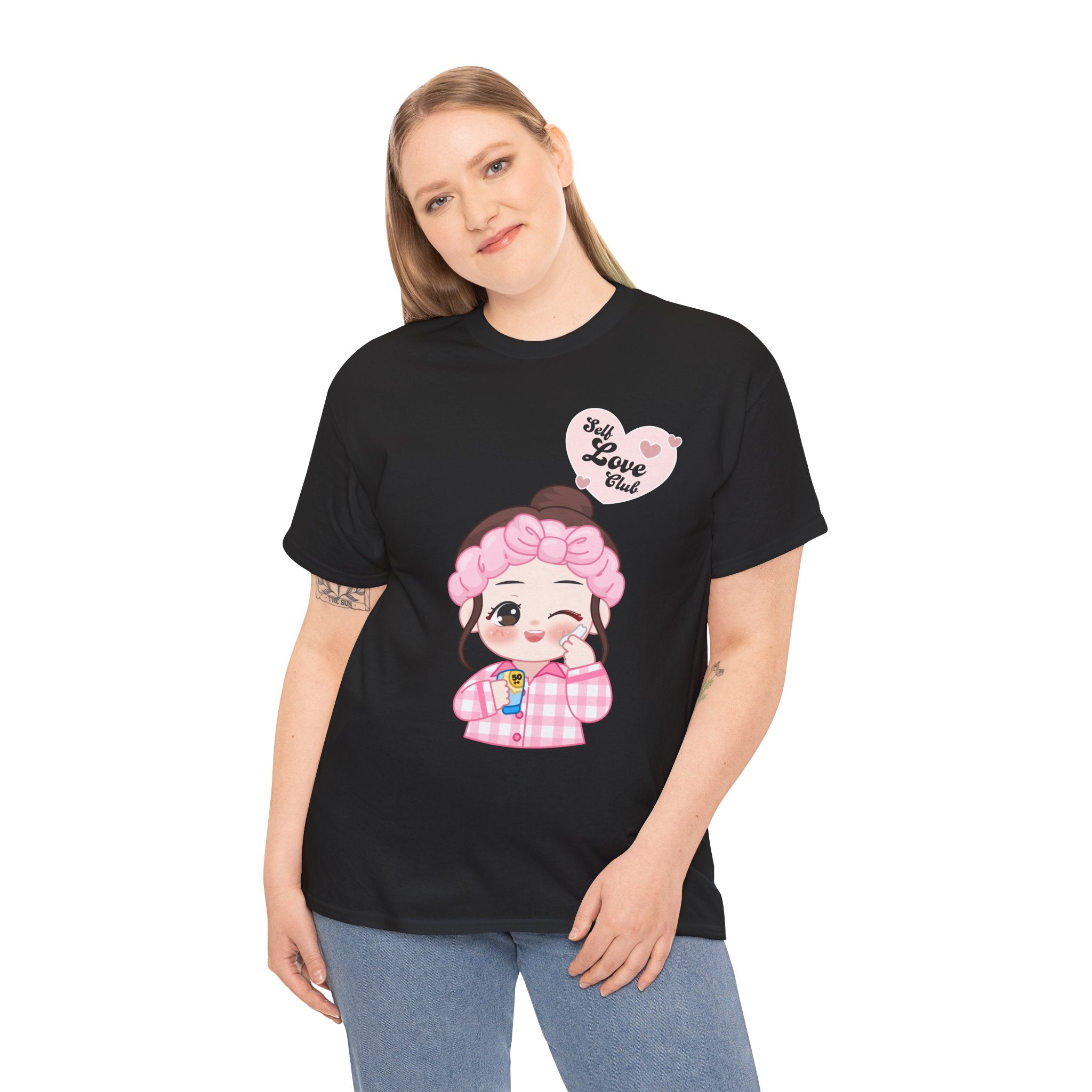 Person wearing a black t-shirt with a cartoon character and text on a white background