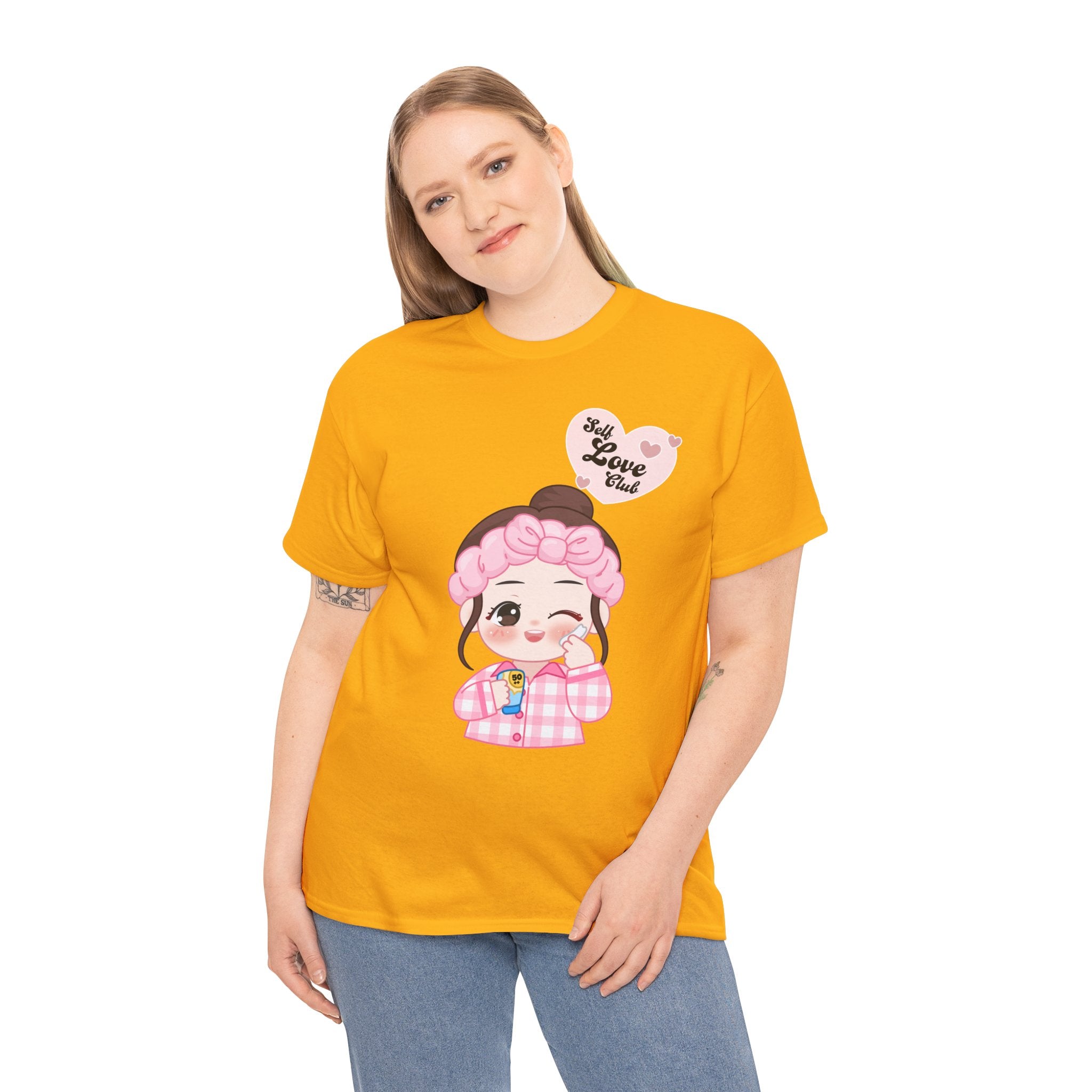 Person wearing a Gold t-shirt with a cartoon character and text on a white background