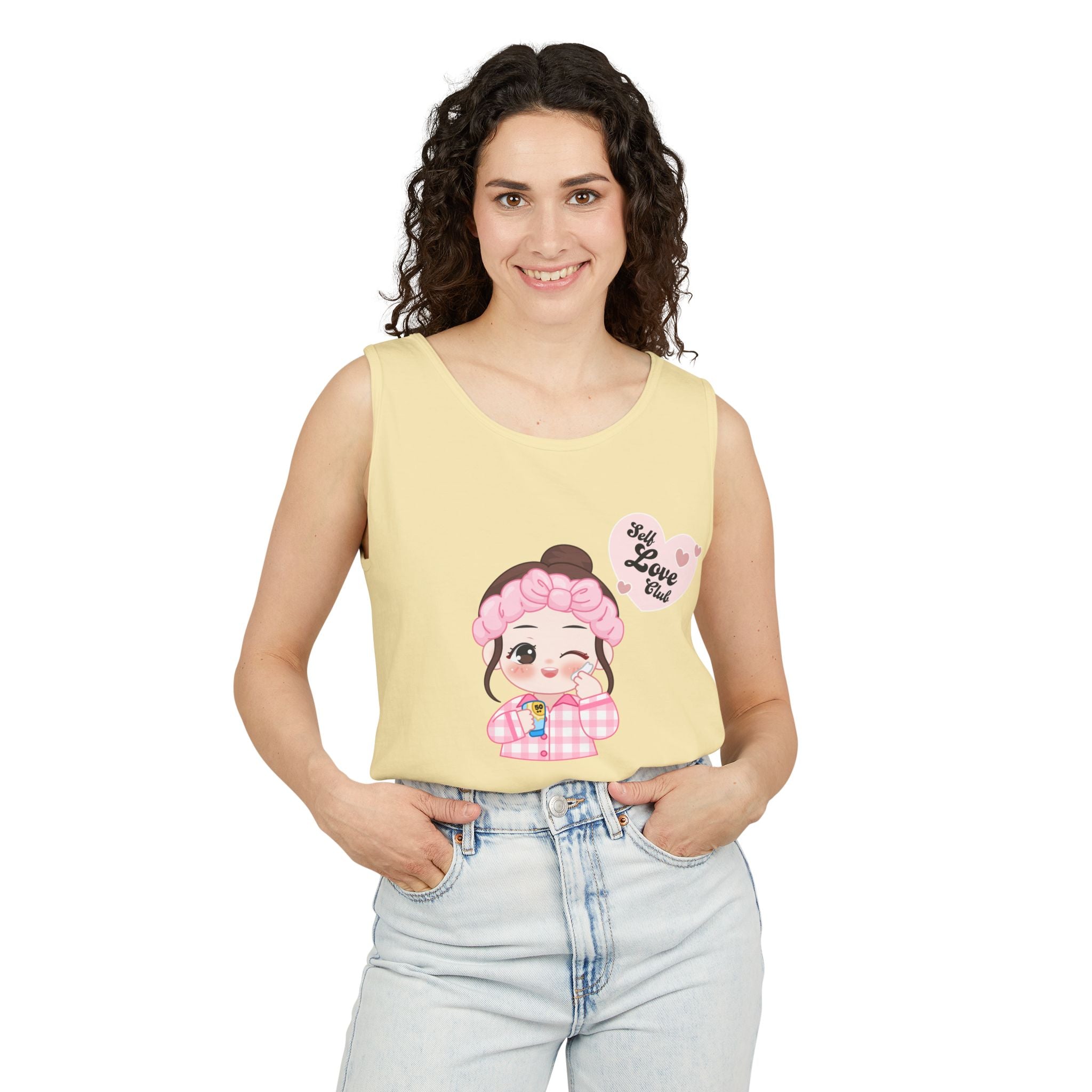 Woman wearing a Butter sleeveless top with a cartoon character design on a white background