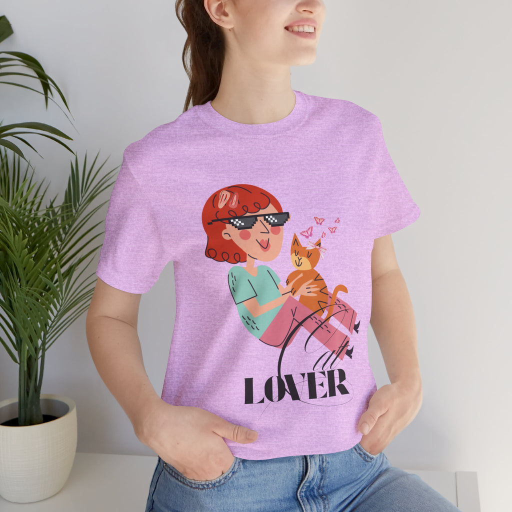 Person wearing a Heaather Prism lilac t-shirt with a graphic design and the word 'Cat LOVER'.