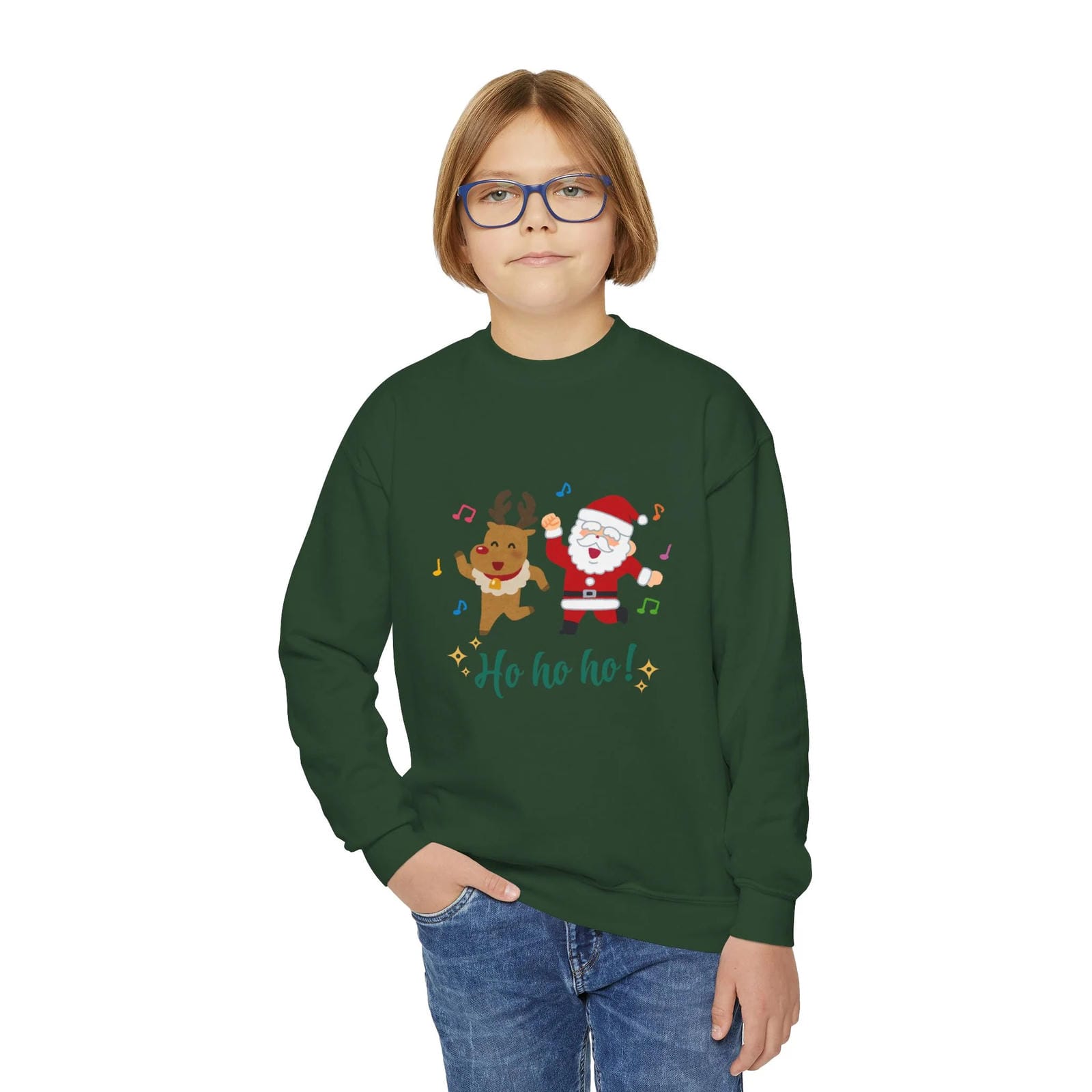 Child wearing a green Christmas-themed sweatshirt with Santa and reindeer design on a white background