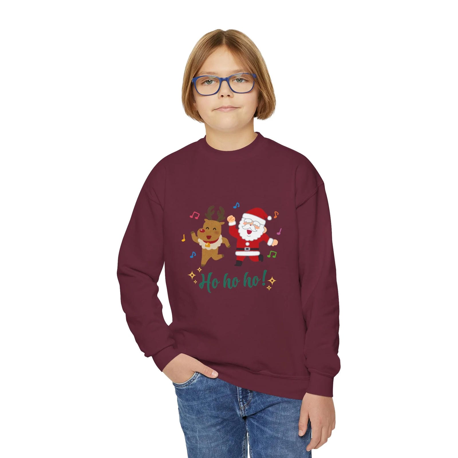 Child wearing a maroon sweatshirt with a Christmas design on a white background