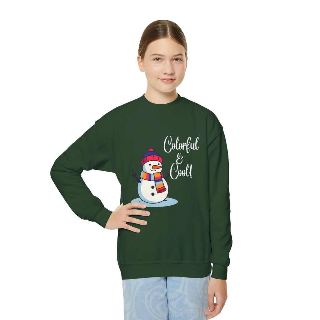 Person wearing a green sweatshirt with a snowman design and text on a white background
