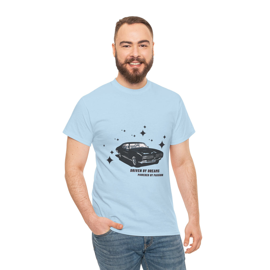Man wearing a light blue t-shirt with a car graphic and text on a white background
