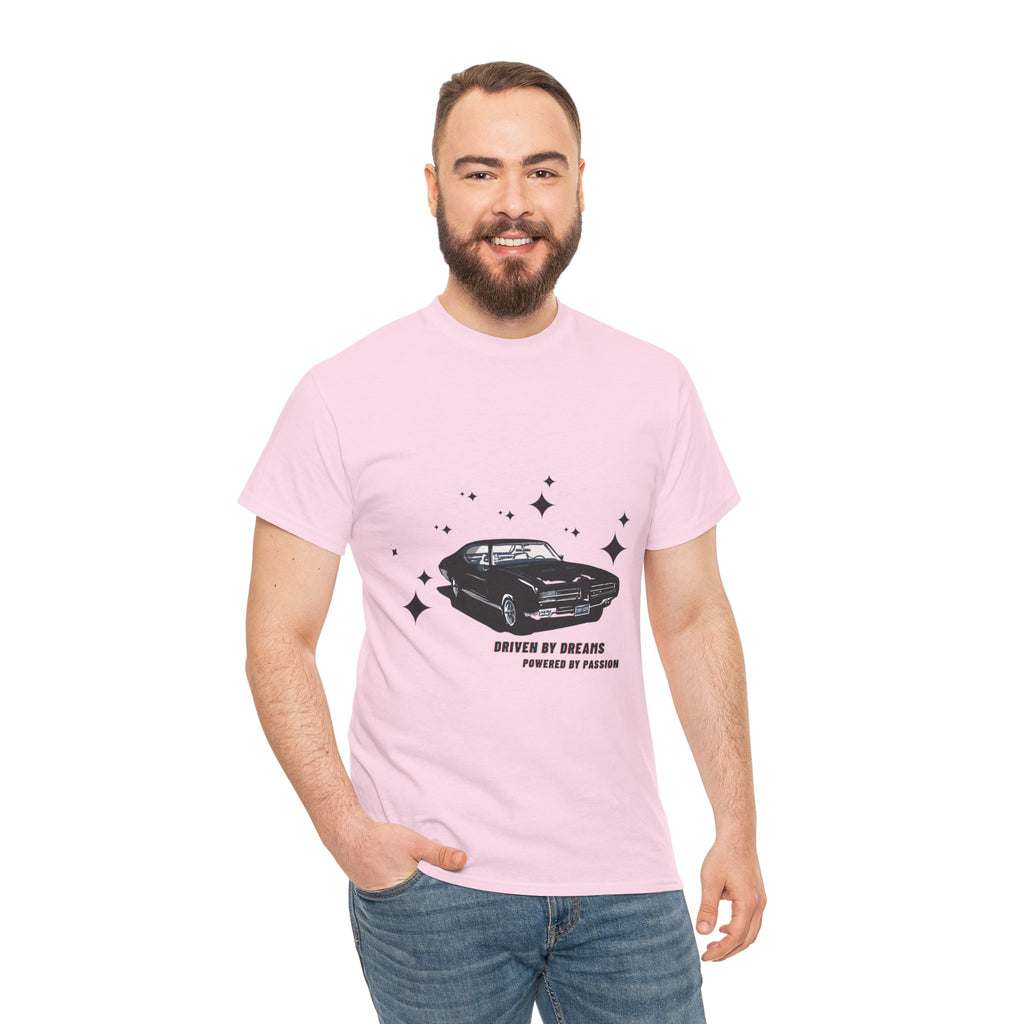 Man wearing a light pink t-shirt with a car graphic and text on a white background
