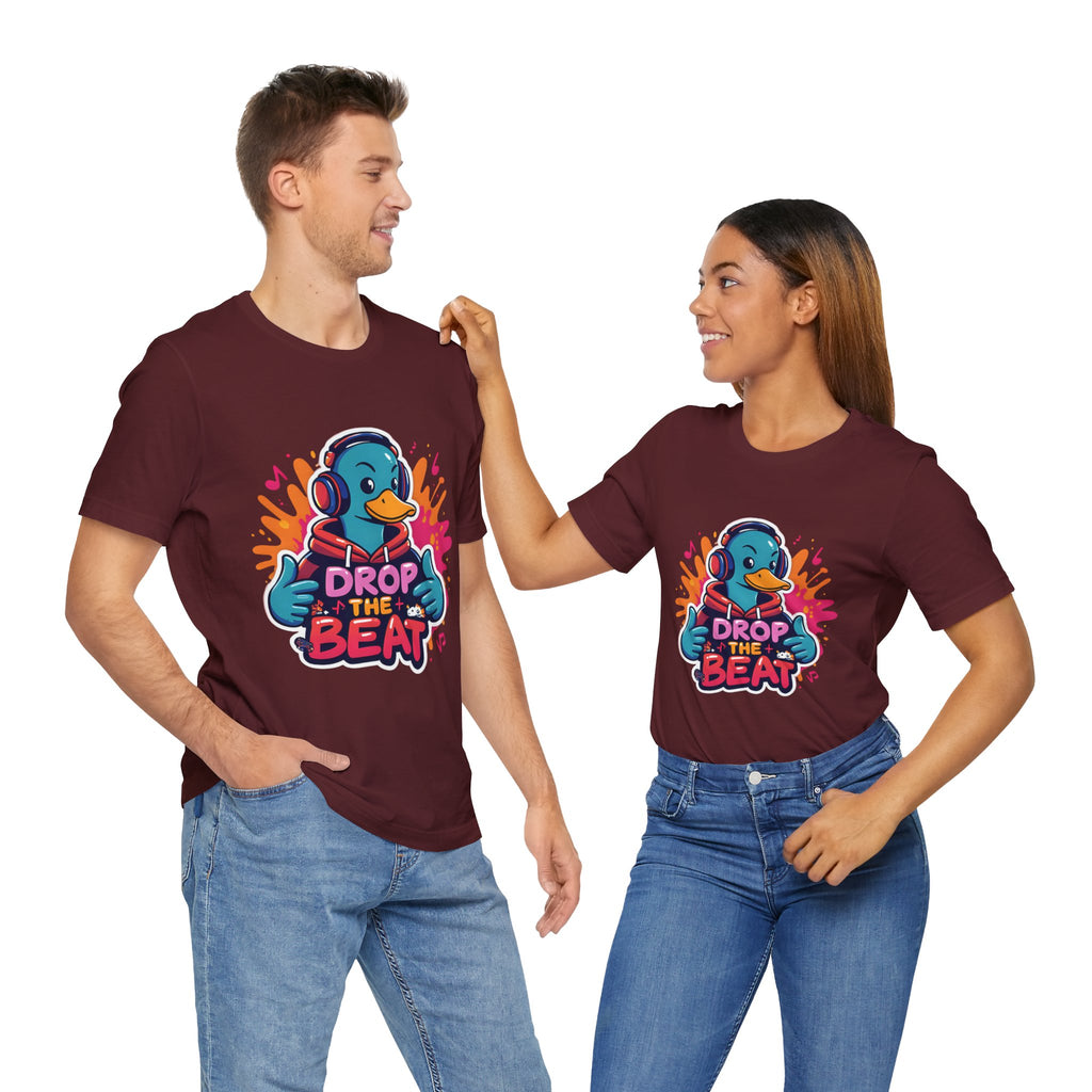 Two people wearing matching maroon t-shirts with a colorful graphic and text on a white background.