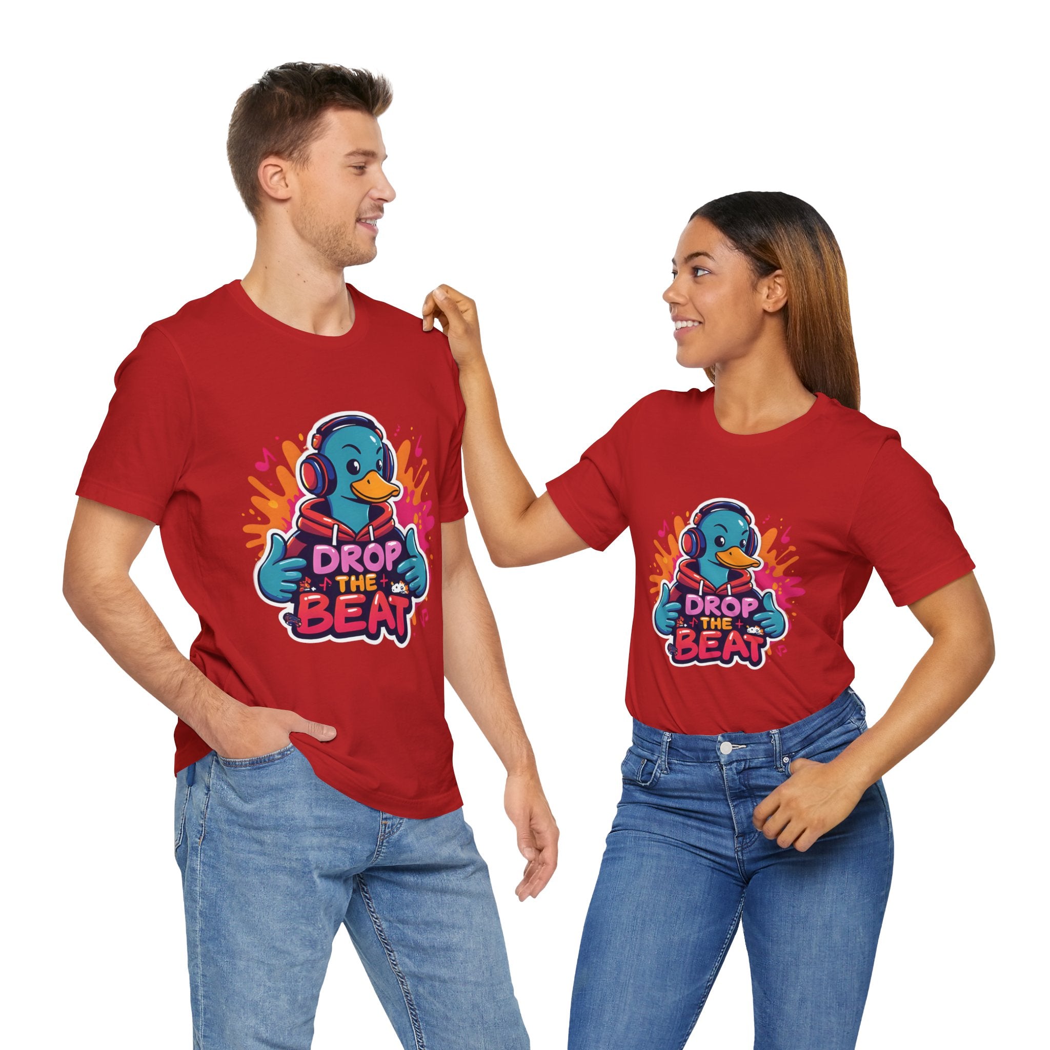 Two people wearing red t-shirts with a colorful graphic and text on a white background