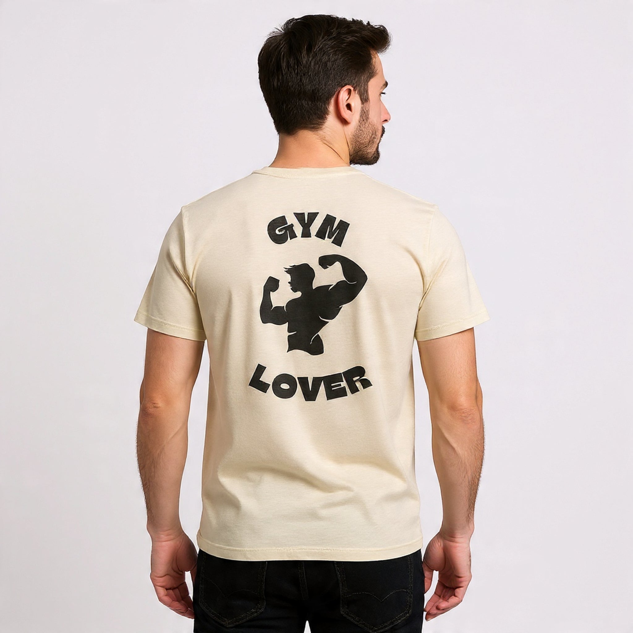 Man wearing a Solid Cream t-shirt with 'Gym Lover' graphic on the back against a light gray background