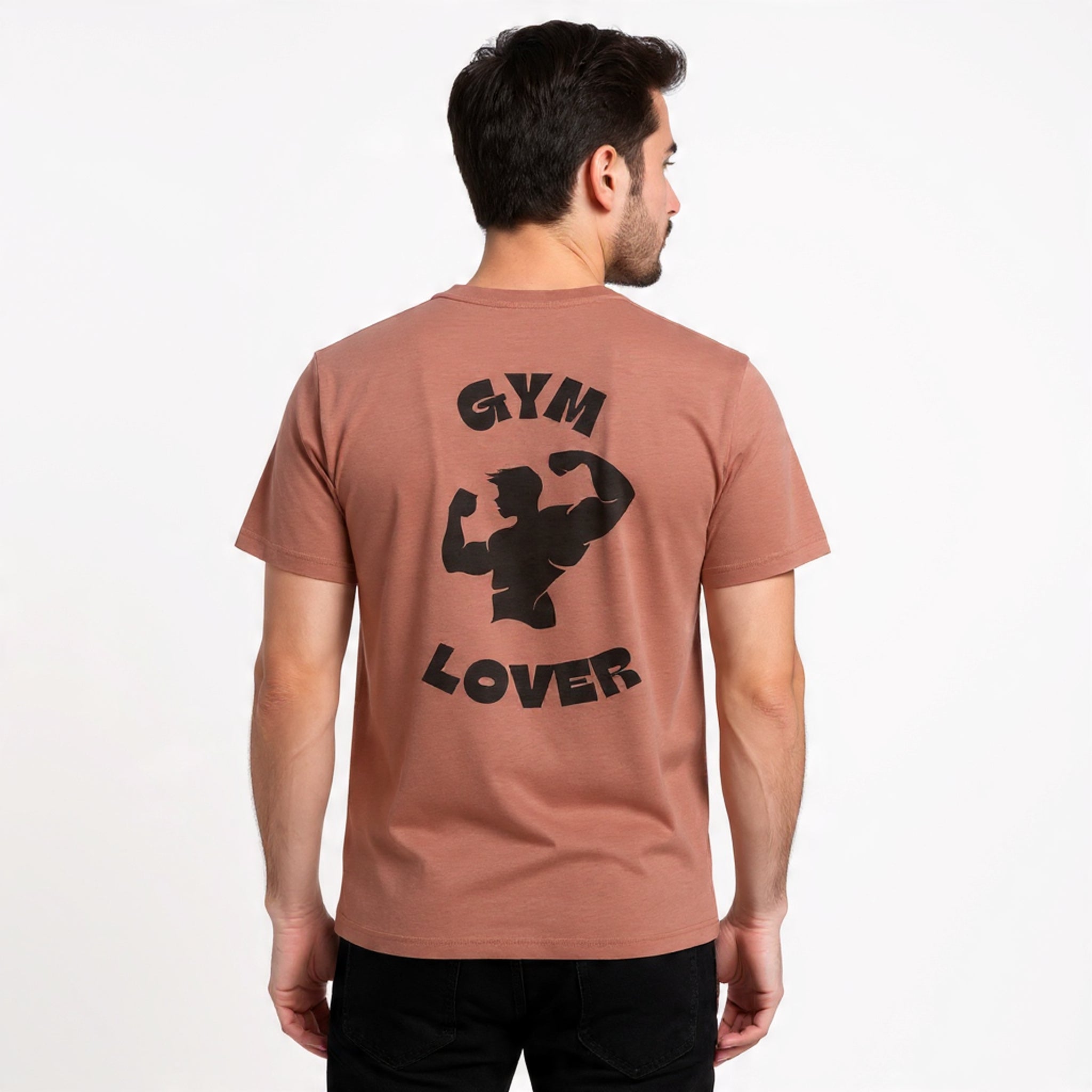 Man wearing a Solid Desert Pink t-shirt with 'Gym Lover' text and graphic on the back.