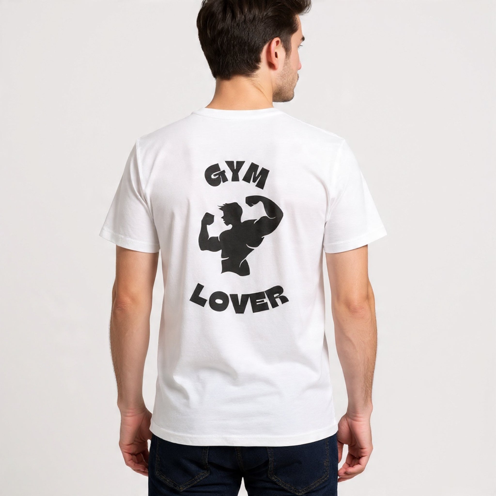 Person wearing a Solid white t-shirt with 'Gym Lover' design on the back against a plain background