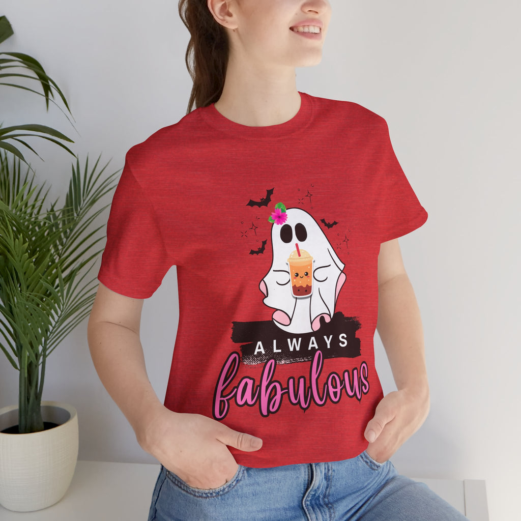 Person wearing a heather red t-shirt with a ghost graphic and 'Always fabulous' text, standing indoors.