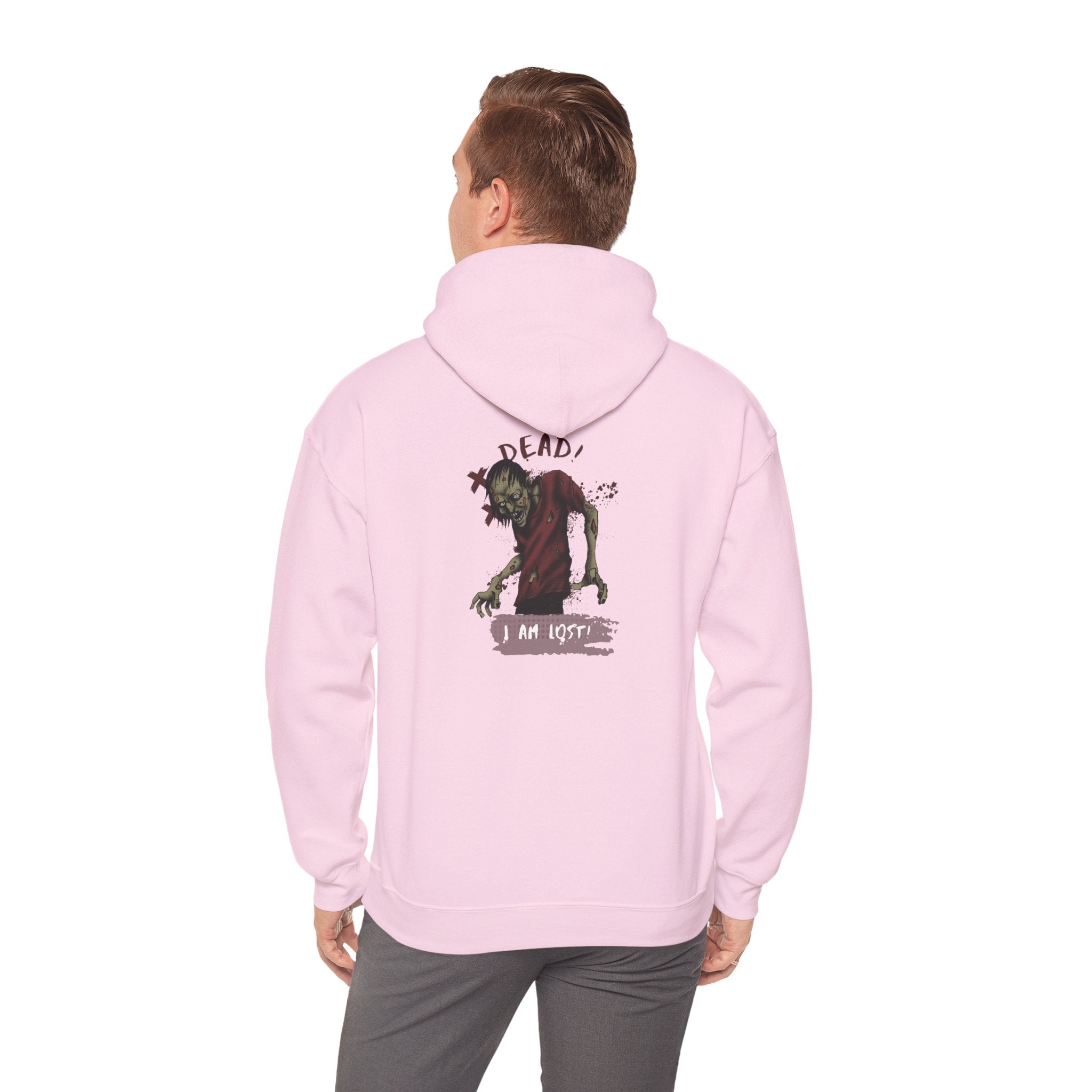 Person wearing a Light pink hoodie with a graphic design on the back, standing against a white background