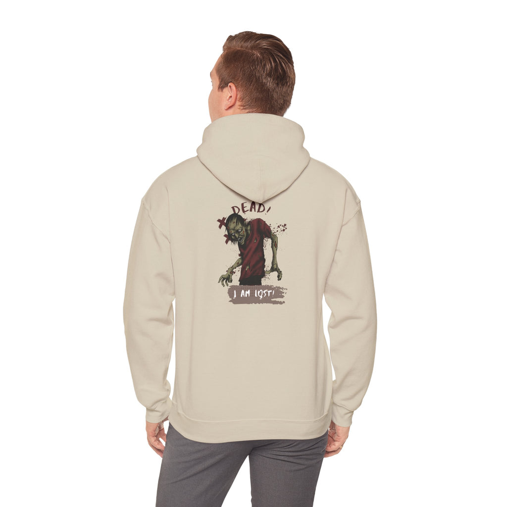 Person wearing a Sand hoodie with a graphic design on the back, standing against a white background