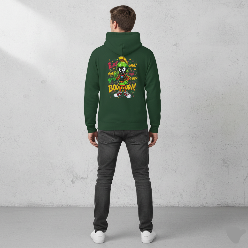 Person wearing a Bottle green hoodie with colorful graphics on the back against a gray concrete wall.