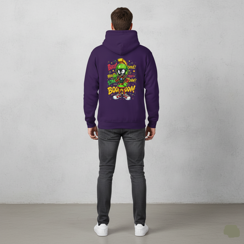 Person wearing a purple hoodie with a character design on the back against a gray background