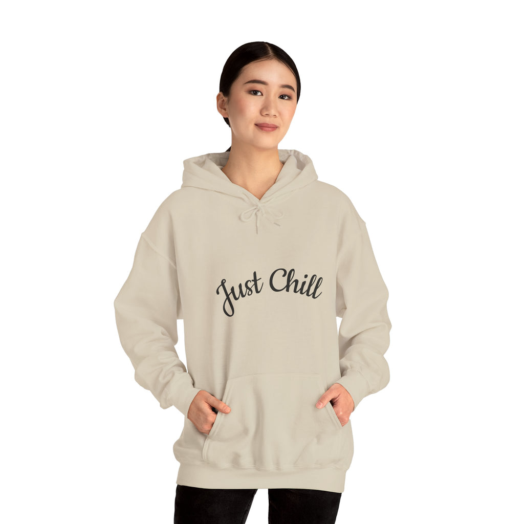Person wearing a Sand hoodie with 'Just Chill' text on a white background