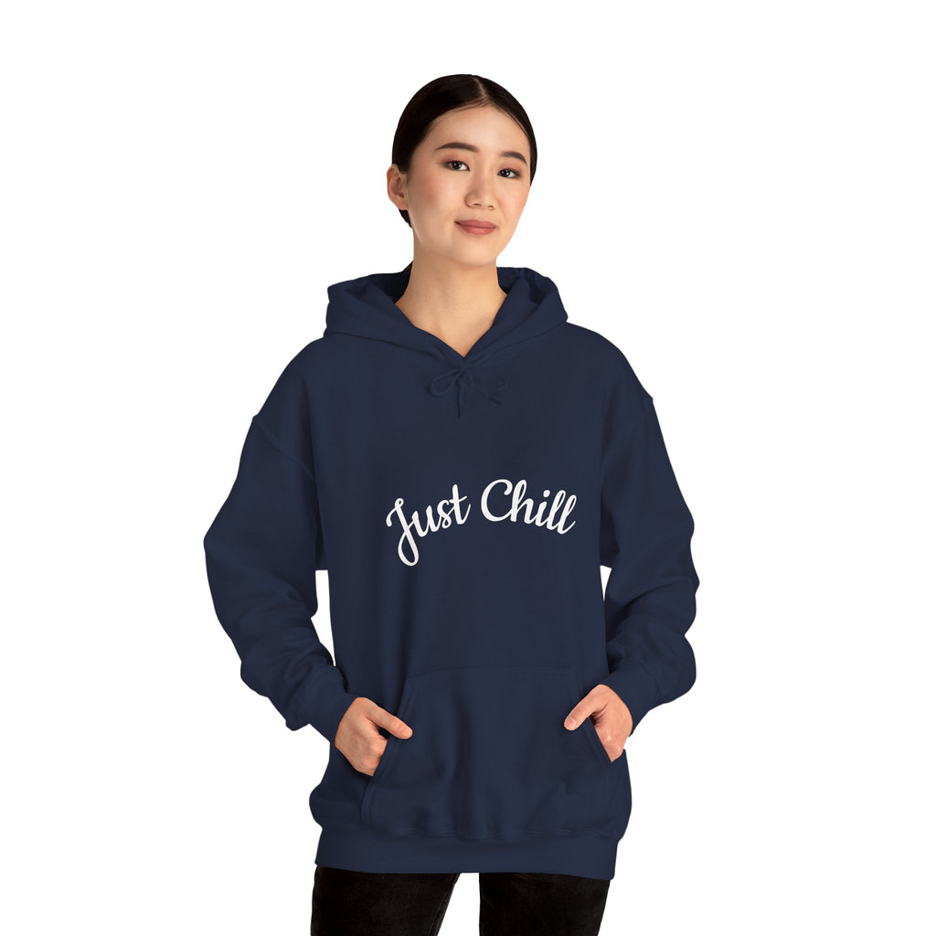 Person wearing a navy hoodie with 'Just Chill' text on a white background