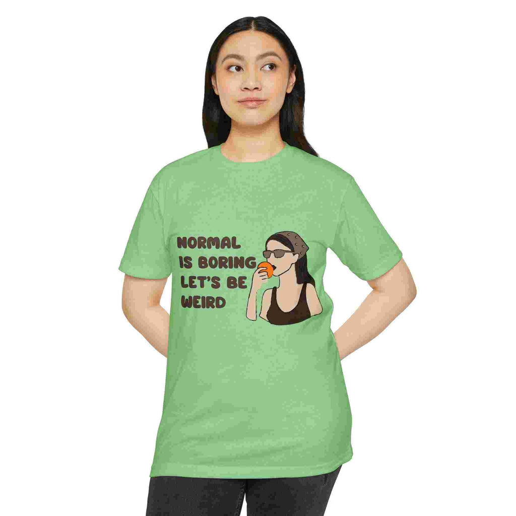 Person wearing an Apple green t-shirt with a graphic and text on a white background