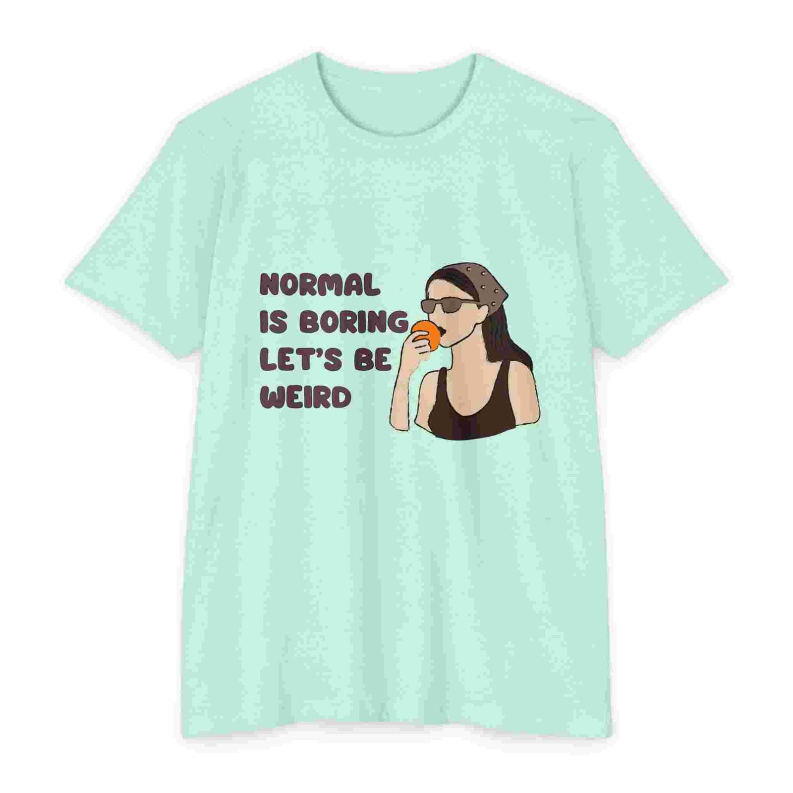 Mint t-shirt with graphic of a woman drinking coffee and text 'Normal is boring, let's be weird' on a white background.