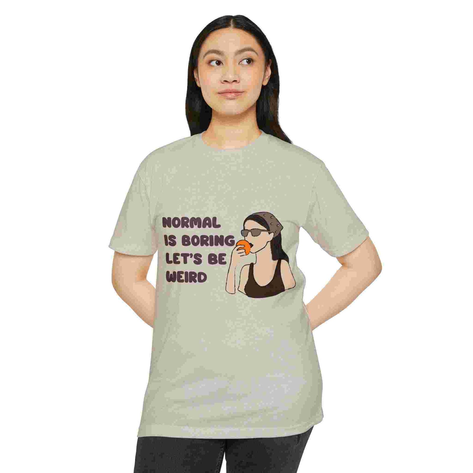 Person wearing a Sand t-shirt with a graphic and text on a white background