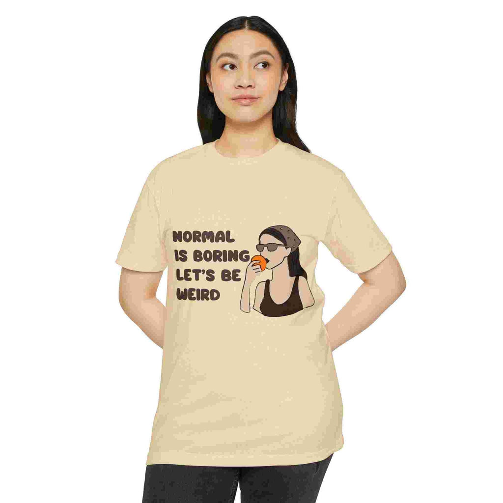Woman wearing a Cream t-shirt with a graphic and text on a white background