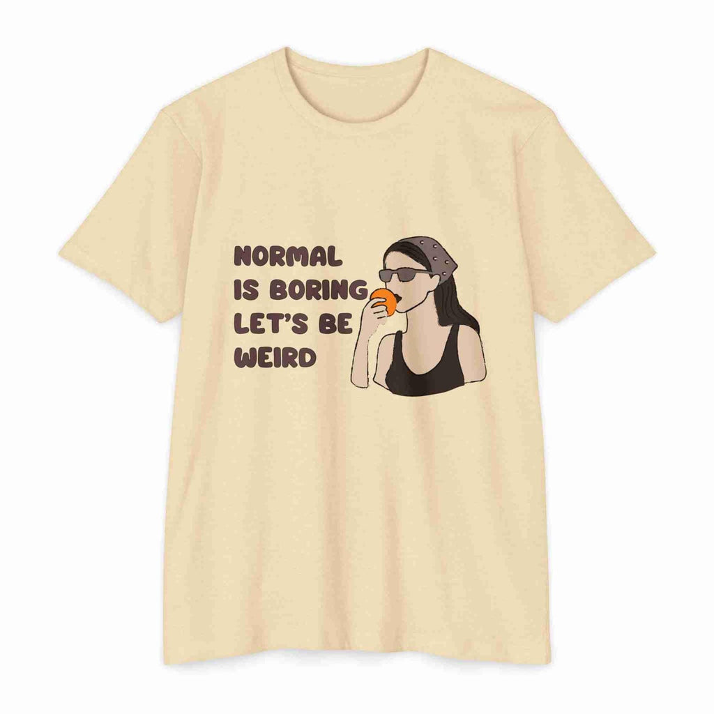 Cream t-shirt with a graphic and text 'Normal is boring, let's be weird' on a white background