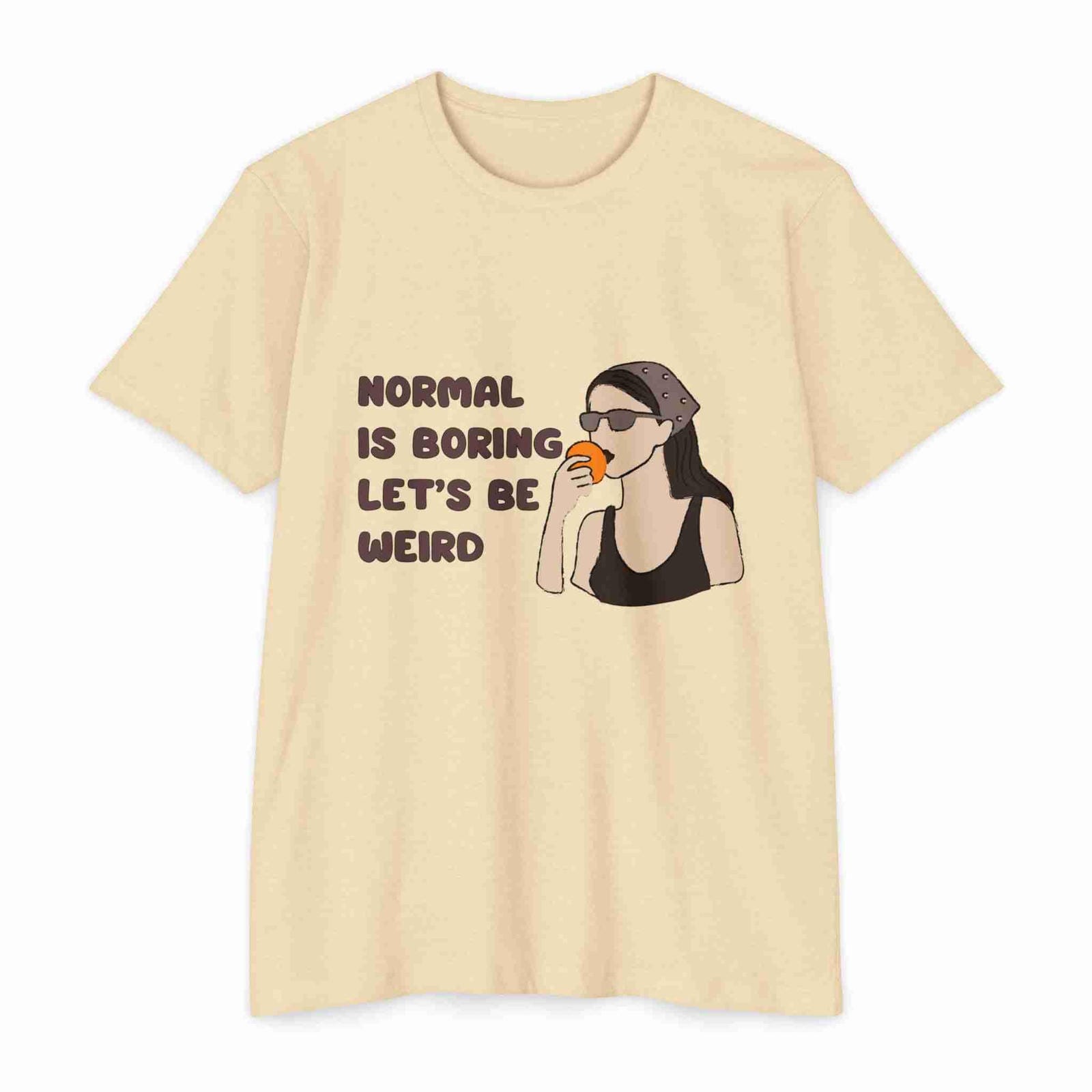 Cream t-shirt with a graphic and text 'Normal is boring, let's be weird' on a white background