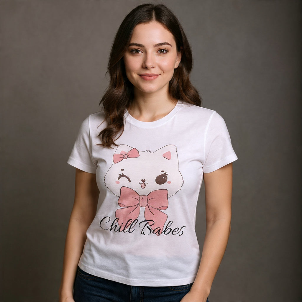 Woman wearing a white t-shirt with a cat graphic and text against a gray background