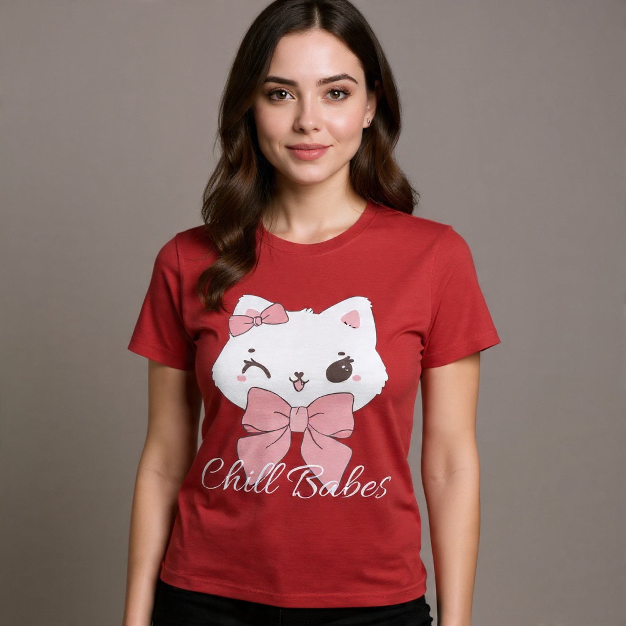 Woman wearing a red t-shirt with a cartoon cat design and 'Chill Babes' text on a plain background